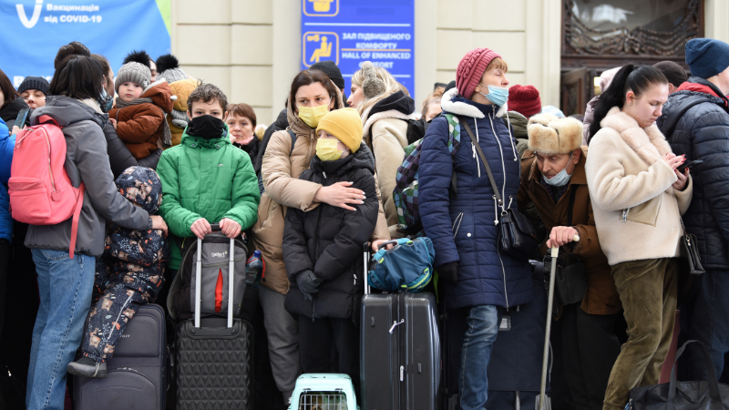 Ukrainian refugees waiting at train station