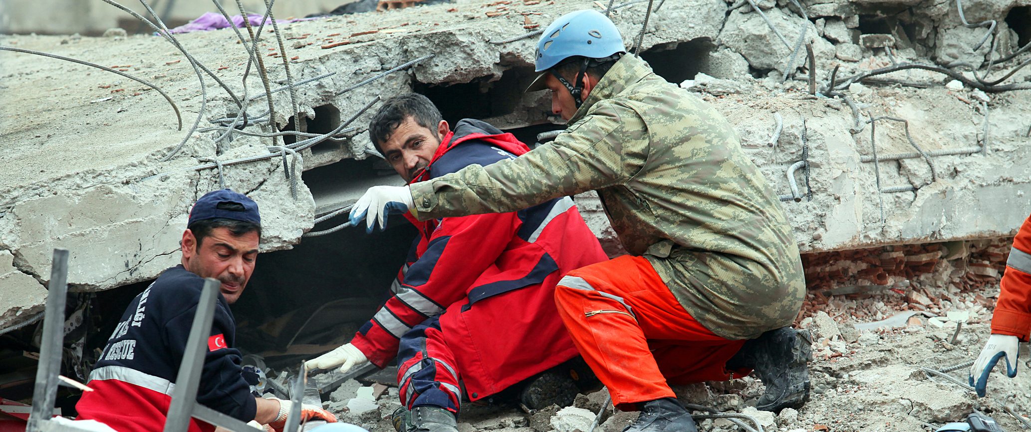 Rescue team is searching for the wounded under the debris
